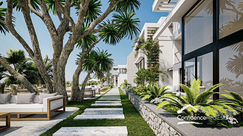Girne'nin banliyösünde, deniz kenarında bir terasa ve özel bahçeye sahip Loft daireler